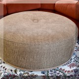F02. Round upholstered ottoman. 14”h x 36”w 